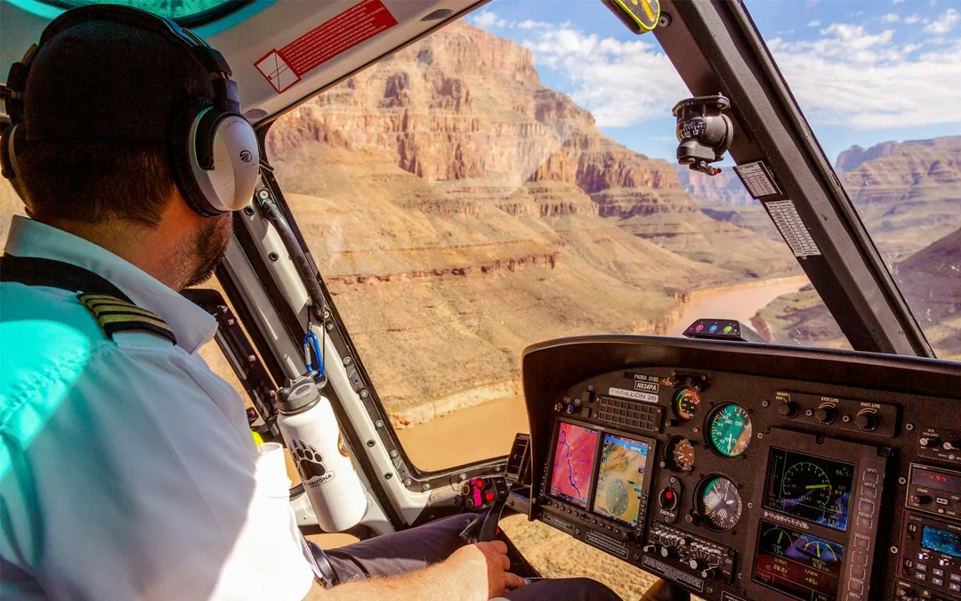70- min Las Vegas to Grand Canyon West Airplane Tour with Helicopter Canyon Floor Landing & Pontoon Boat Ride Image 2