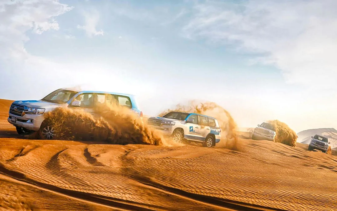 Abu Dhabi Premium Desert Safari with BBQ Dinner, Camel Ride and Sandboarding Image 11
