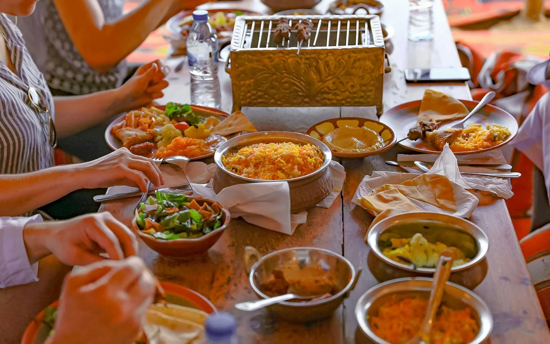 Abu Dhabi Premium Desert Safari with BBQ Dinner, Camel Ride and Sandboarding Image 4