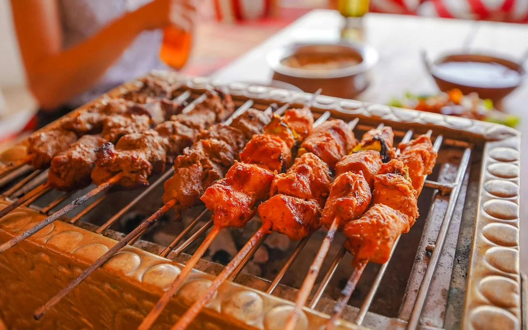 Abu Dhabi Premium Desert Safari with BBQ Dinner, Camel Ride and Sandboarding Image 5