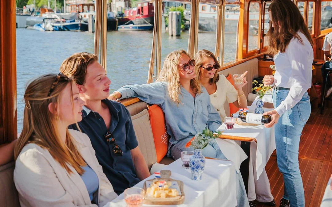 Amsterdam: 1-Hour Luxury Saloon Boat Cruise with Unlimited Drinks & Cheese Image 3