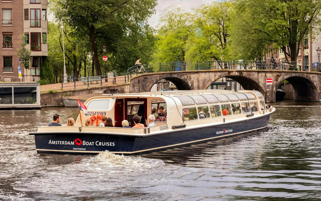 Amsterdam: 90-Min FEBOAT Canal Cruise with Dutch Snacks & Drink Image 1