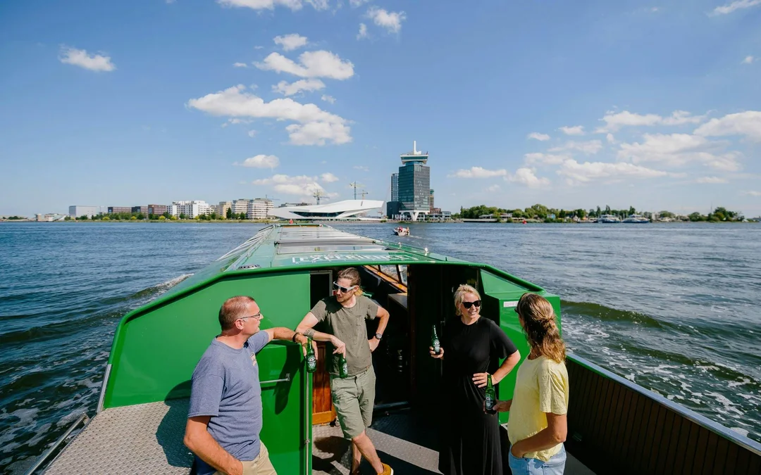 Amsterdam: Heineken Canal Cruise with Live Guide and 1 Drink Image 1