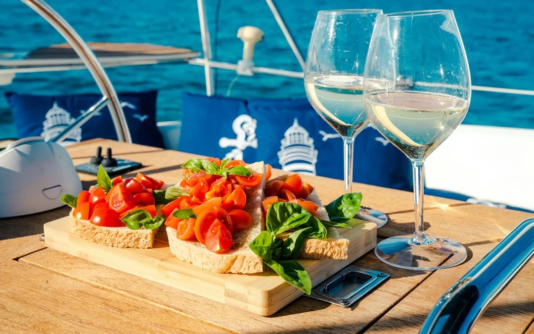 Capo Comino Small-Group Sailing Cruise with Lunch and Snorkeling Image 1