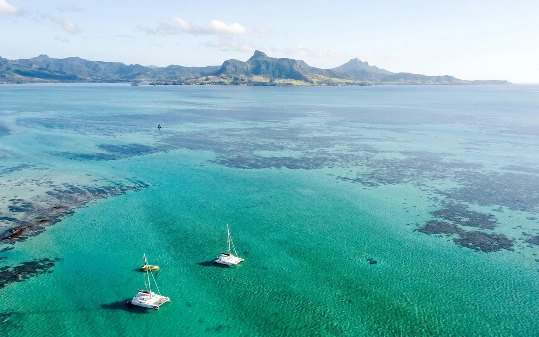 Catamaran Adventure Full Day: Ile aux cerfs, GRSE Waterfall, Snorkeling & BBQ Lunch Image 1