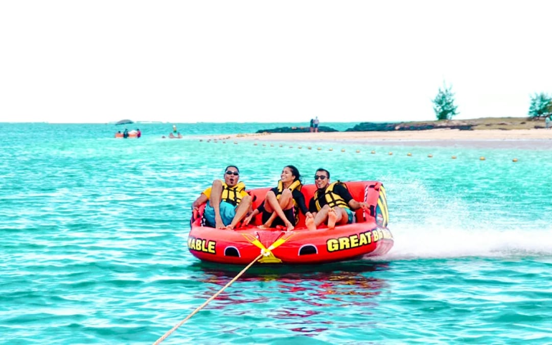 Catamaran Cruise to Ile aux Cerfs with Parasailing, Tube Riding, Lunch & Drinks Image 2