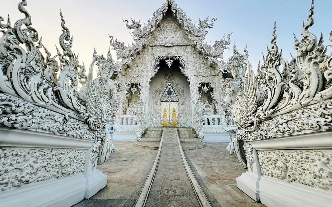 Chiang Rai: White Temple, Blue Temple, Black House & Golden Triangle Guided Tour with Hotel Transfers Image 10
