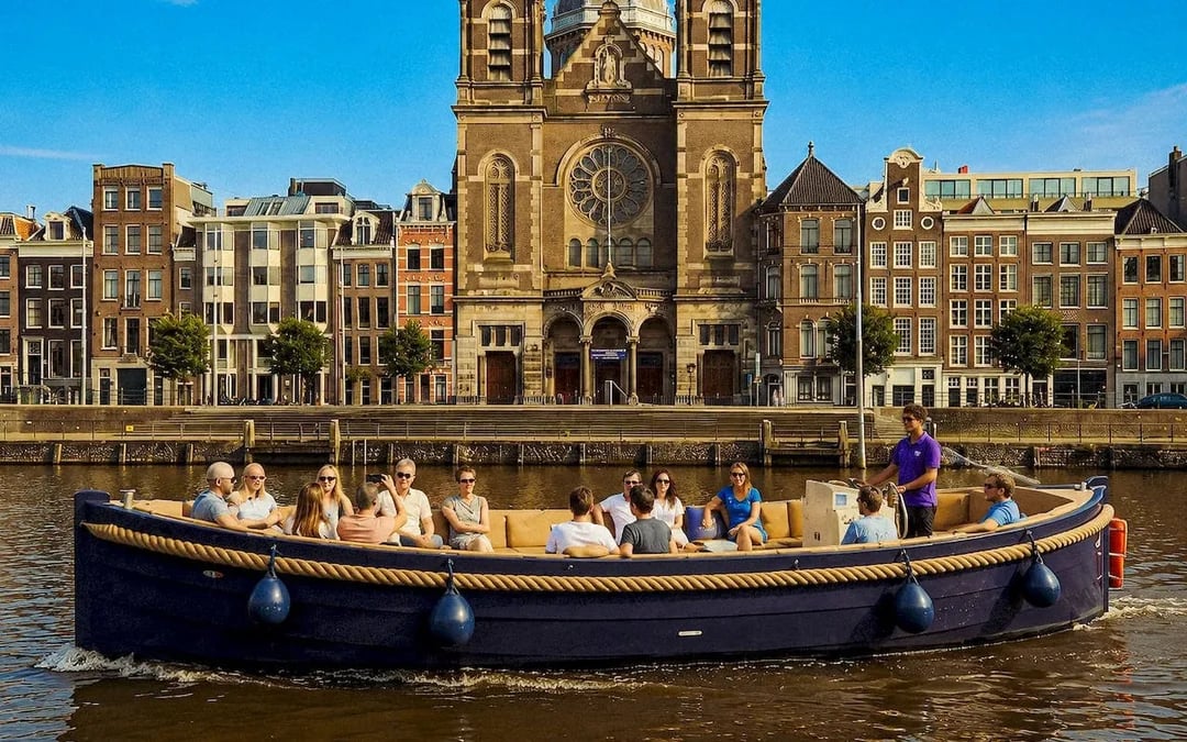 Combo: Moco Museum Tickets & Morning Open-Boat Canal Cruise Image 7