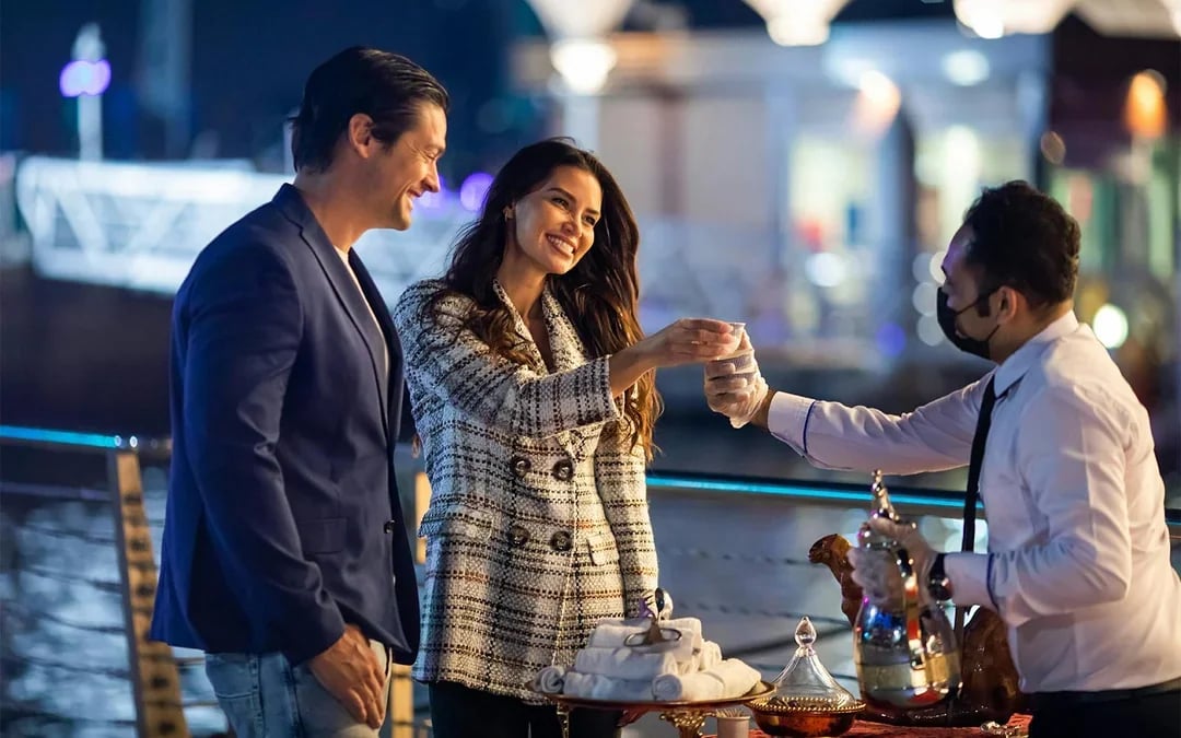 Dine & Dazzle Evening Package: Dubai Canal Dinner Cruise with Unlimited Drinks + La Perle Show Image 7