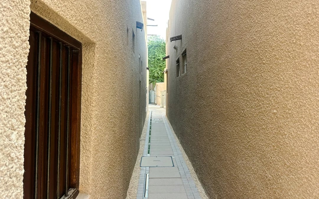 Dubai Al Fahidi Old Town Walking Tour with Abra Ride and Spice and Gold Souks Image 4