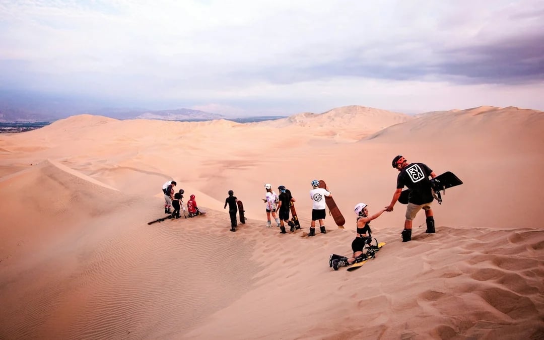 Dubai Morning Desert Safari with Dune Bashing, Sandboarding and Camel Ride Image 5