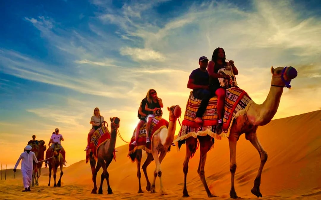 Dubai Private 4x4 Desert Safari with Dune Bashing Camel Ride Sandboarding and BBQ Dinner Image 7