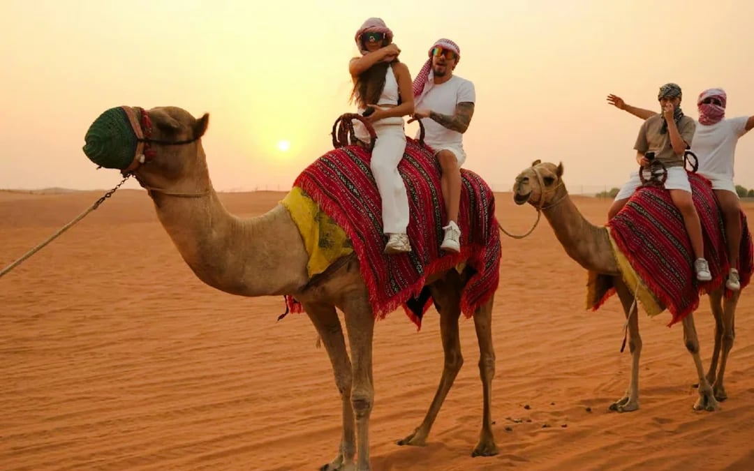 Dubai Red Dunes Desert Safari with BBQ Dinner Camel Ride and Live Shows Image 1