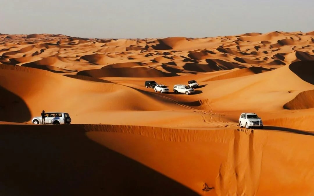 Dubai Red Dunes Desert Safari with BBQ Dinner, Camel Ride, Sandboarding and Hotel Transfers Image 4