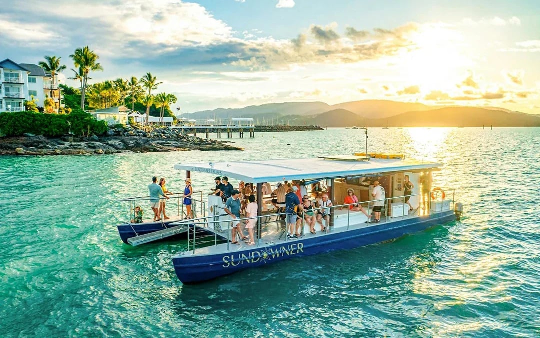 From Airlie Beach: Sundowner Whitsunday Cruise with Sparkling Wine Image 1