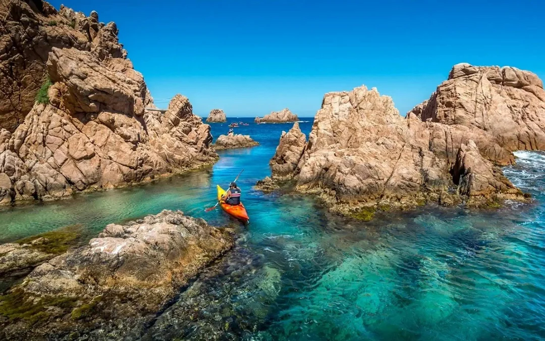 From Barcelona: Costa Brava Day Trip with Kayak, Snorkel, Cliff Jump & Lunch Image 1
