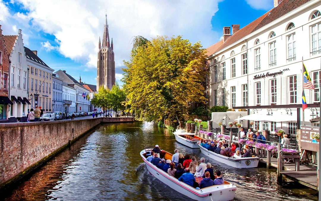 From Brussels: Bruges & Ghent Tour with Cruise & Chocolate Tasting Image 1
