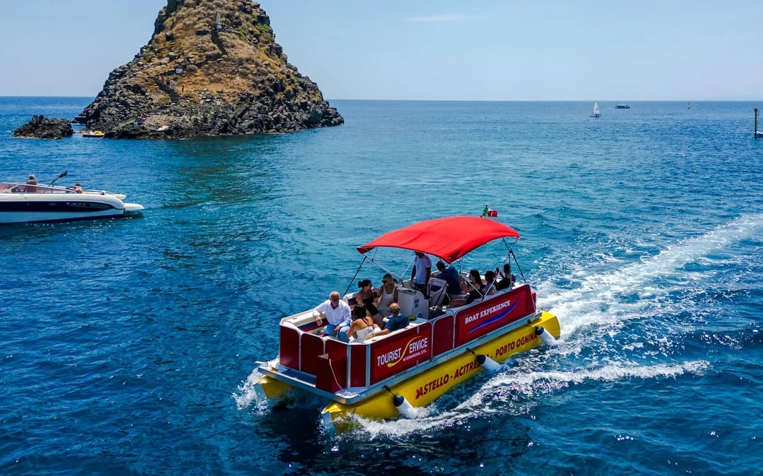 From Catania: Cyclops Coast Boat Tour with Welcome Aperitif and Swimming Stop Image 1