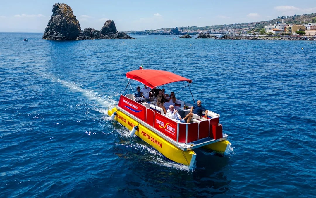 From Catania: Cyclops Coast Boat Tour with Welcome Aperitif and Swimming Stop Image 4