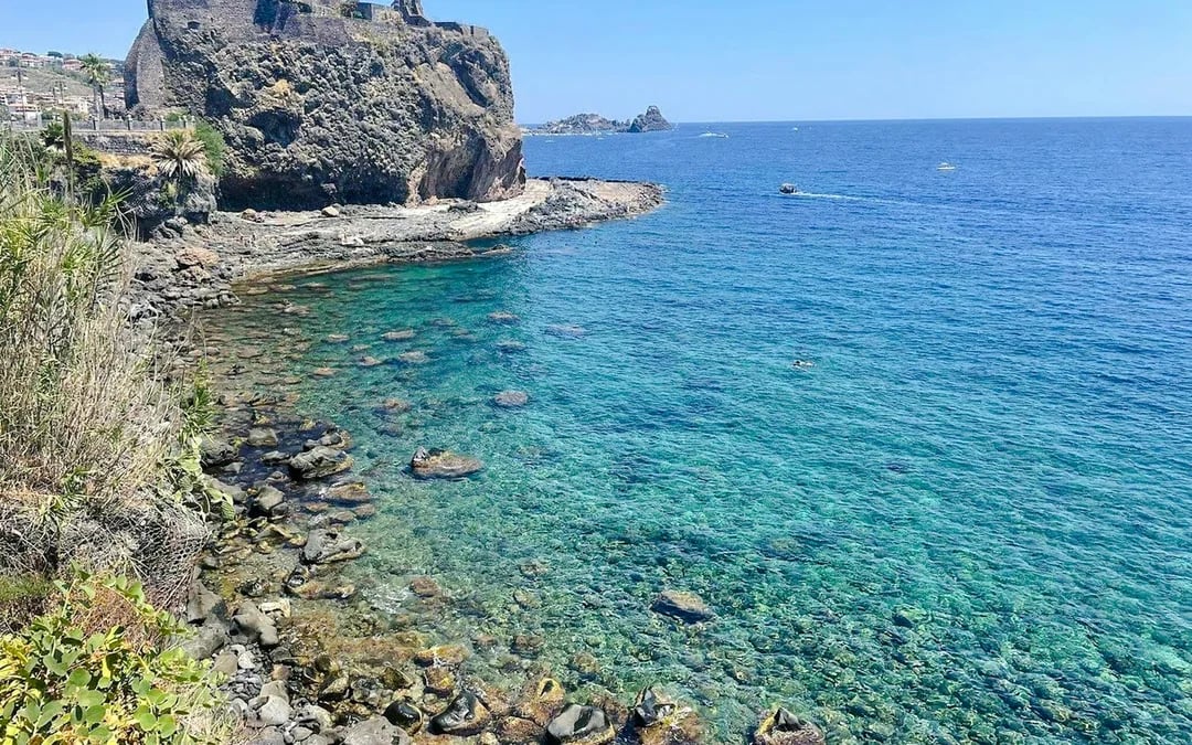 From Catania: Cyclops Coast Boat Tour with Welcome Aperitif and Swimming Stop Image 6