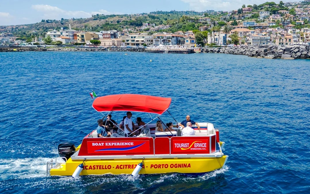 From Catania: Cyclops Coast Boat Tour with Welcome Aperitif and Swimming Stop Image 7