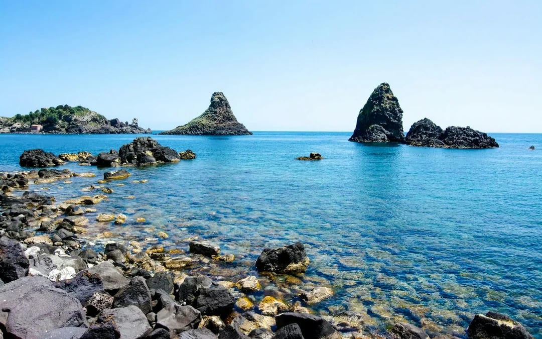 From Catania: Cyclops Coast Boat Tour with Welcome Aperitif and Swimming Stop Image 8