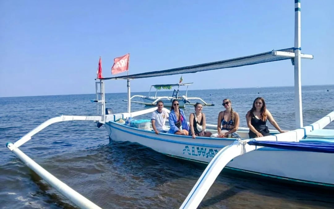 From Central Bali: Private Lovina Dolphin-Watching Boat Tour including Swimming with Dolphins and Snorkeling Image 1