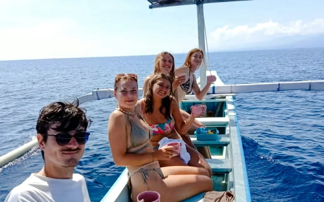 From Central Bali: Private Lovina Dolphin-Watching Boat Tour including Swimming with Dolphins and Snorkeling Image 6