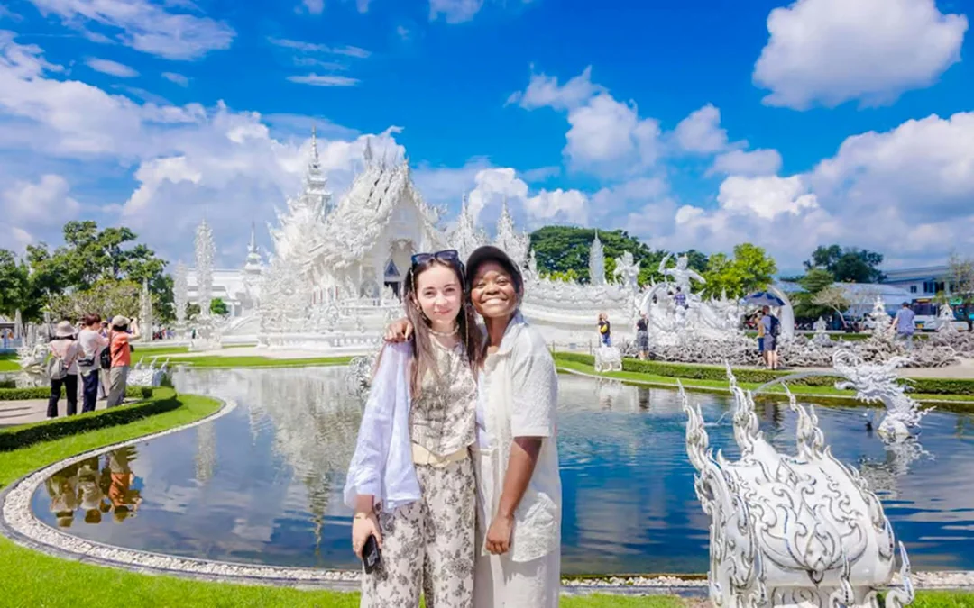 From Chiang Mai: Hot Springs and Chiang Rai White, Black & Blue Temple Day Tour with Lunch & Hotel Transfers Image 1