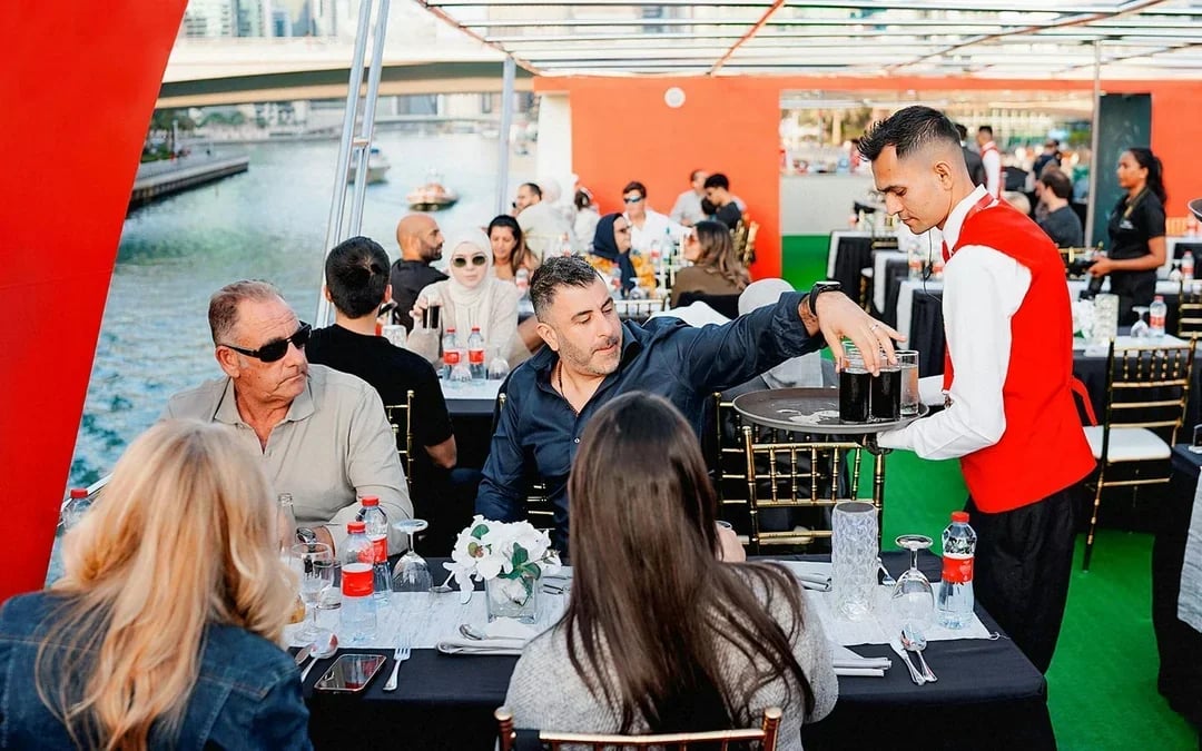 From Dubai Marina: 1.5-Hour Sunset/Dinner Cruise with Open Bar, Live Music & International Buffet Image 7
