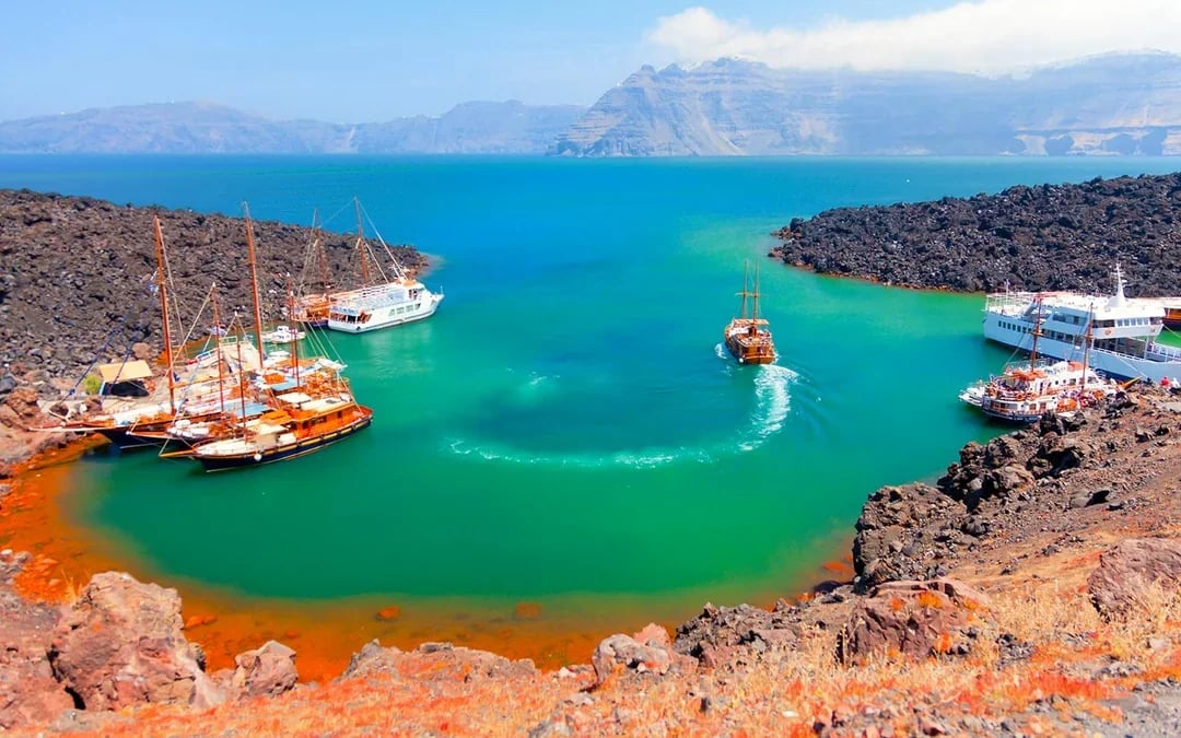 From Fira: Santorini Volcano, Hot Springs & Thirassia Day Cruise Image 1