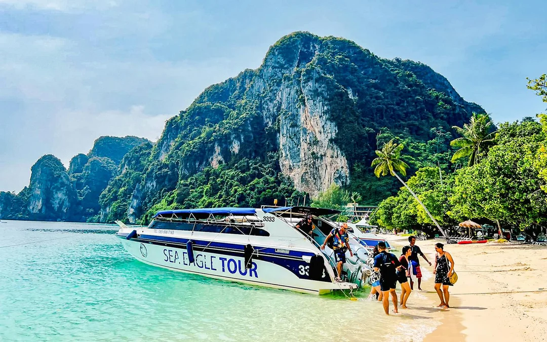 From Krabi: Early Bird Phi Phi & 4 Islands Tour by Speedboat with Breakfast, Lunch & Transfers Image 1