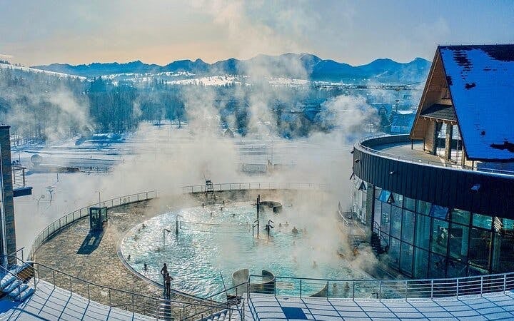 From Krakow: Tatra Mountains Guided Snowmobile Tour with Cheese Tasting and Chocholow Thermal Pools Transfers Image 4