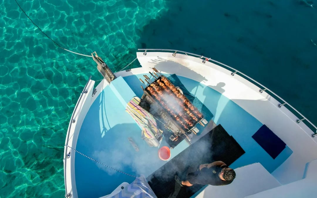 From Paphos: Blue Lagoon Afternoon Cruise with Swim, BBQ & Wine Image 1