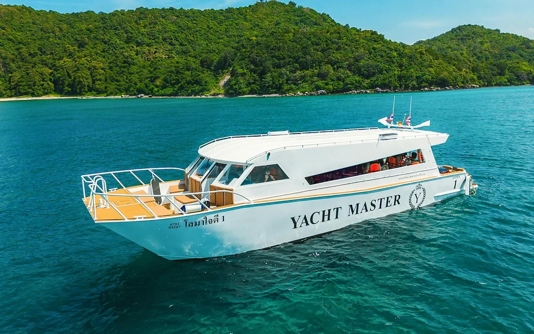 From Phuket: Sunset Tour of Phi Phi, Maya Bay & Bamboo Island by Premium Speed Catamaran with Lunch & Hotel Transfers Image 1