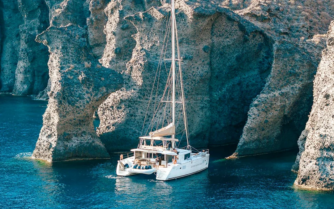 From Santorini: Luxury Catamaran Day Cruise with Lunch, Drinks & Transfers Image 1