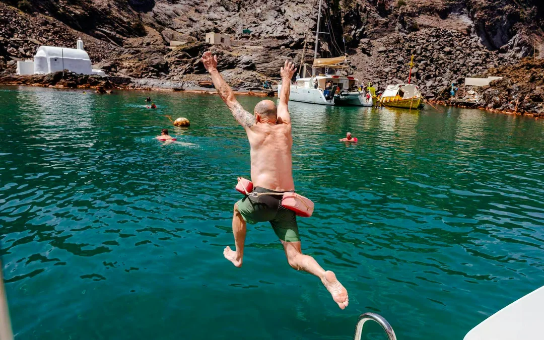From Santorini: Premium Catamaran Cruise with Meal, Drinks & Transfers Image 3