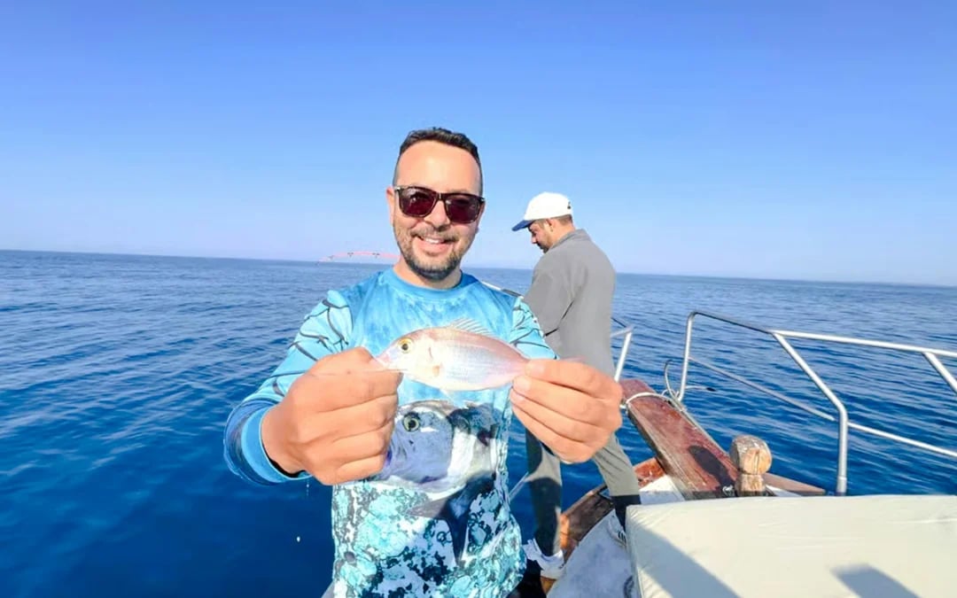 From Side: Open-Sea Fishing Trip with Hotel Transfers Image 5