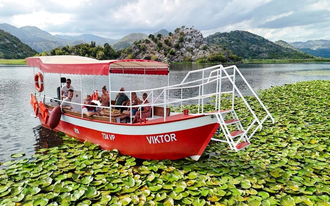 From Virpazar: Lake Skadar Guided Boat Tour & Kom Monastery with Drinks Image 1
