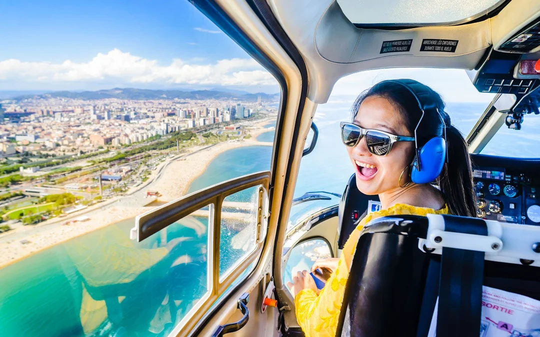 Helicopter Flight, Walking Tour, & Boat Cruise in Barcelona Image 1