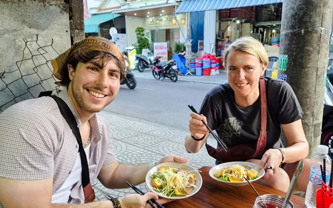 Hoi An Small-Group Food Walking Tour with Paper Lantern Release and Hoai River Boat Ride Image 1
