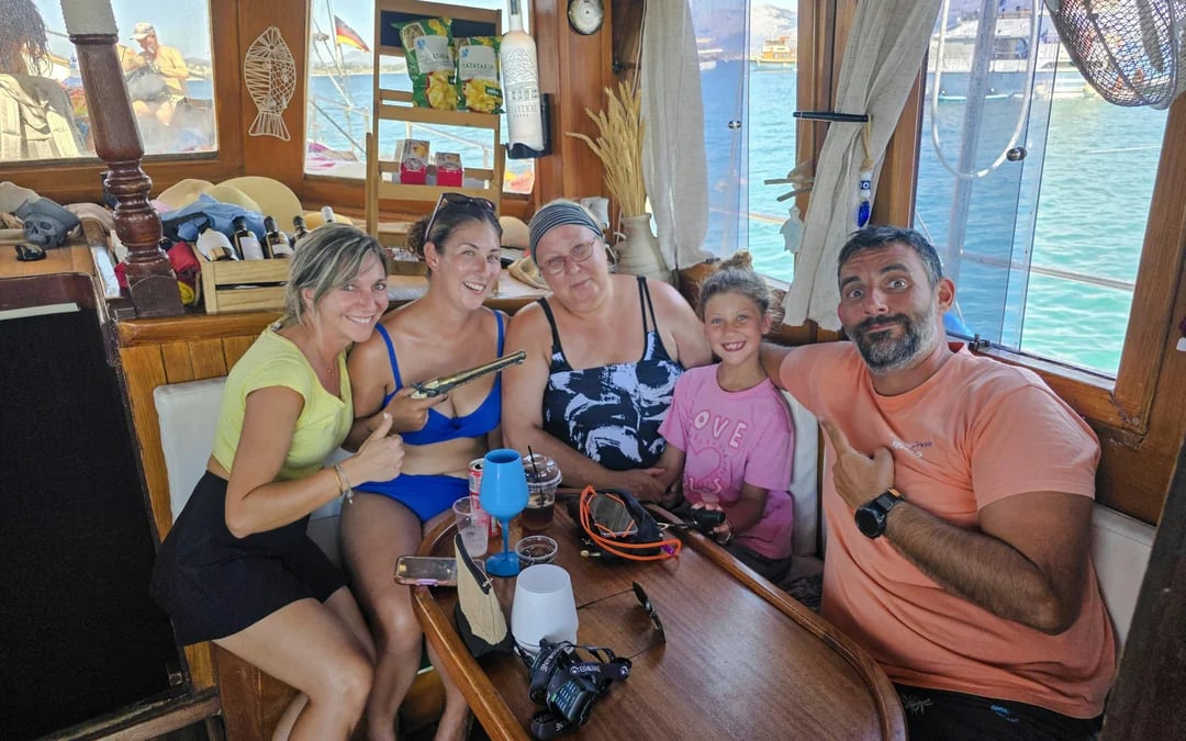 Kefalonia Day Cruise to White Rocks Beach and Vardiani Island with Homemade Greek Cuisine Image 6