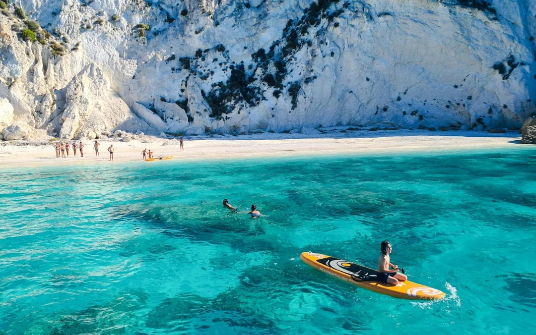 Kefalonia Day Cruise to White Rocks Beach and Vardiani Island with Homemade Greek Cuisine Image 7