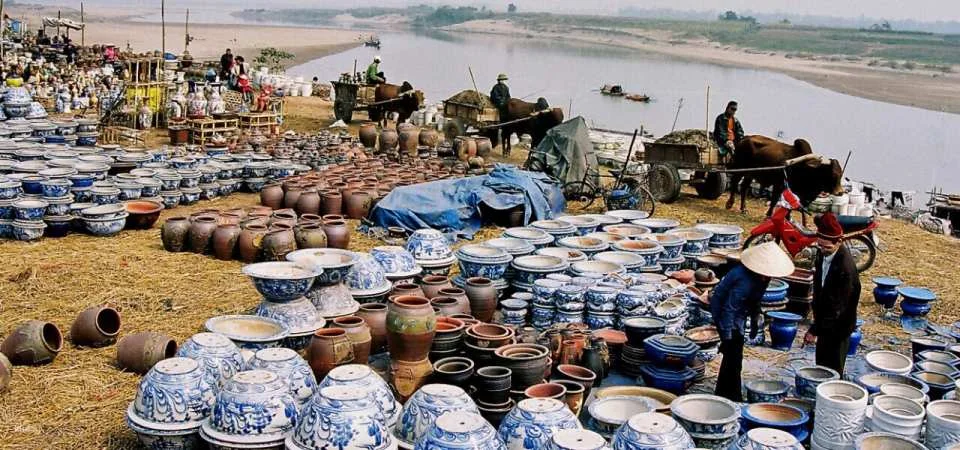 From Ha Noi city - Full day visit Bat Trang pottery village and Fish trap Village