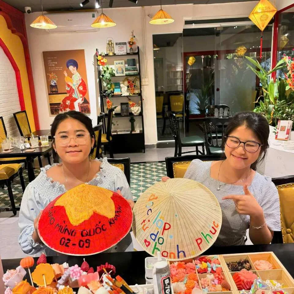 Hue | Conical Hat Painting Workshop with Royal Tea with Local Instructor | A must do experience in Vietnam