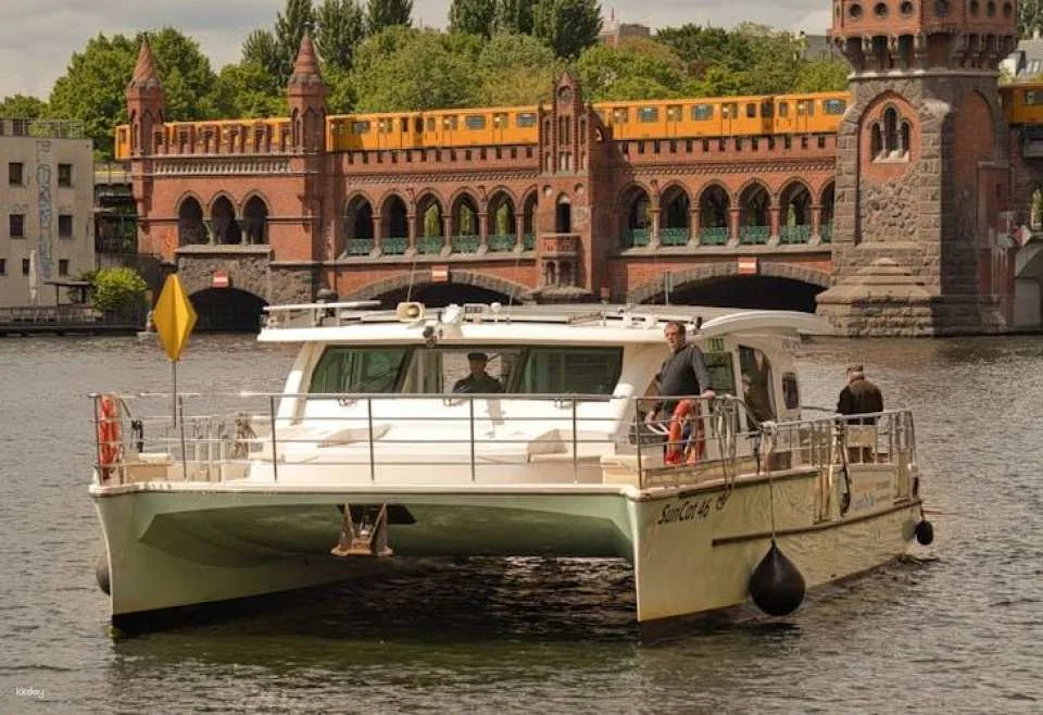 Solar-powered catamaran cruise on Berlin's Spree River at sunset