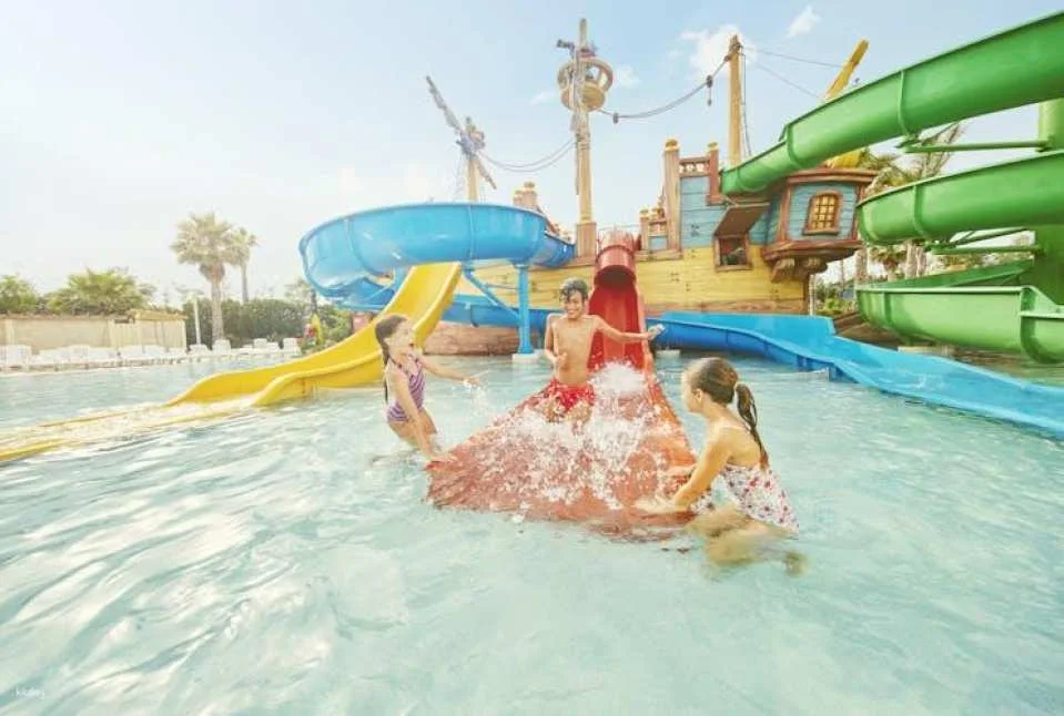 Caribe Aquatic Park by day and PortAventura Park by night 1-day combo