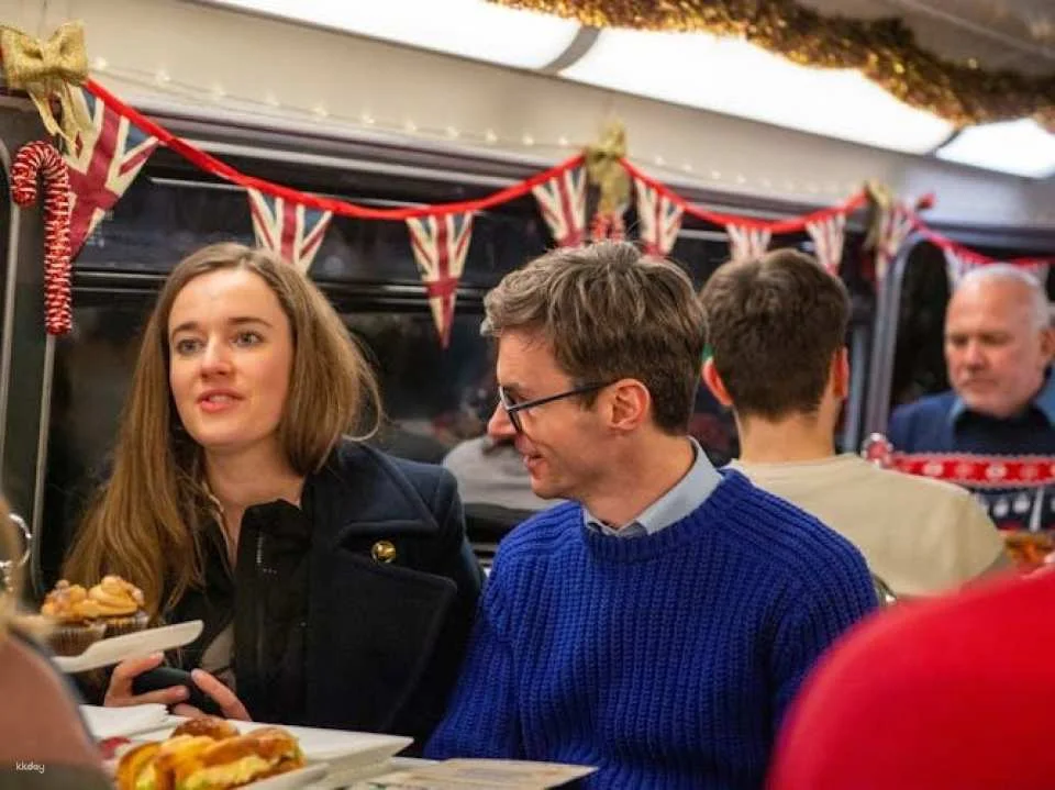 London Christmas bus tour with afternoon tea and snacks