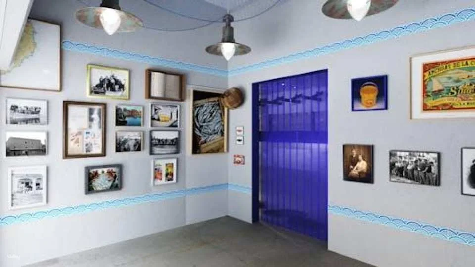 Anchovy factory museum entrance with audioguide and tasting