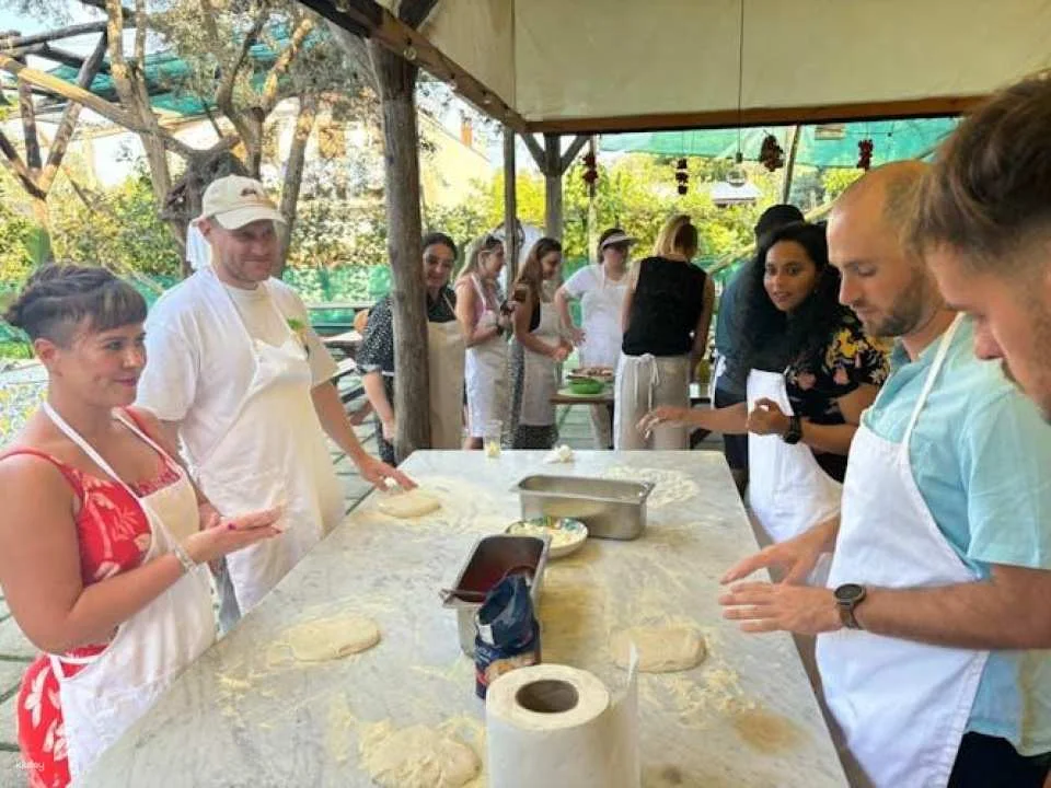 Hands-on Italian pizza making class in Sorrento garden